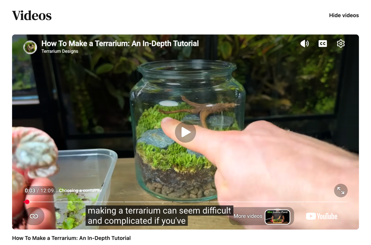 Product detail page Videos section showing a featured YouTube video player with title, channel name, and a thumbnail strip for switching videos