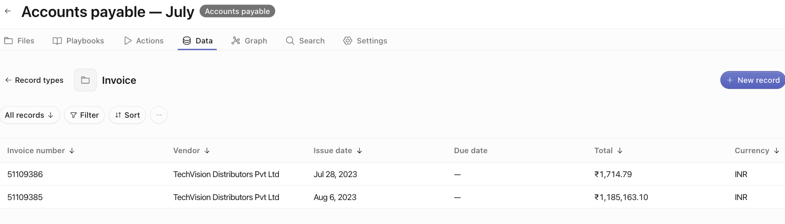 The space Data tab showing the Invoice record type's table with two approved invoice records as rows