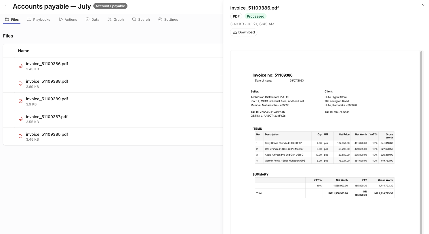 The Files tab table with a file drawer open, showing the PDF badge, Processed status, Download button, and an inline invoice preview