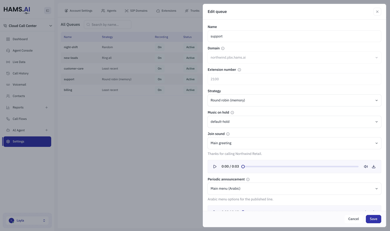 The Queues tab with a queue open on its distribution strategy, hold music and announcements.