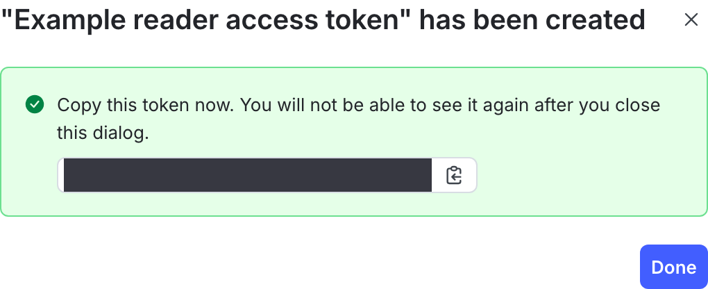 A new access token with a reminder to copy and store it displayed.