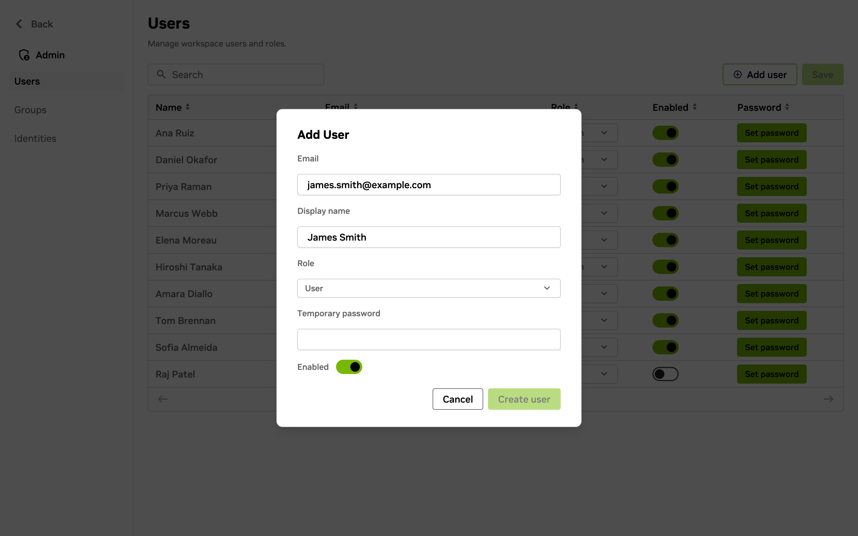 Users page in the Admin panel with the Add User dialog open, showing the email, display name, role, and temporary password fields