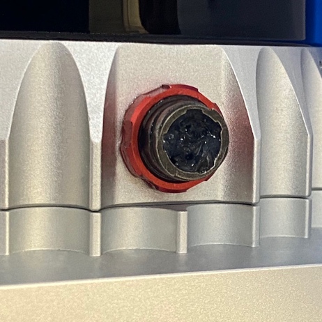 Sensor receptacle dielectric grease application
