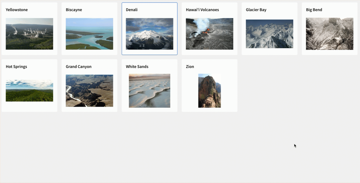 A user navigates a gallery of 10 cards. Each time they select a card, a modal displays with additional information about the park they selected.